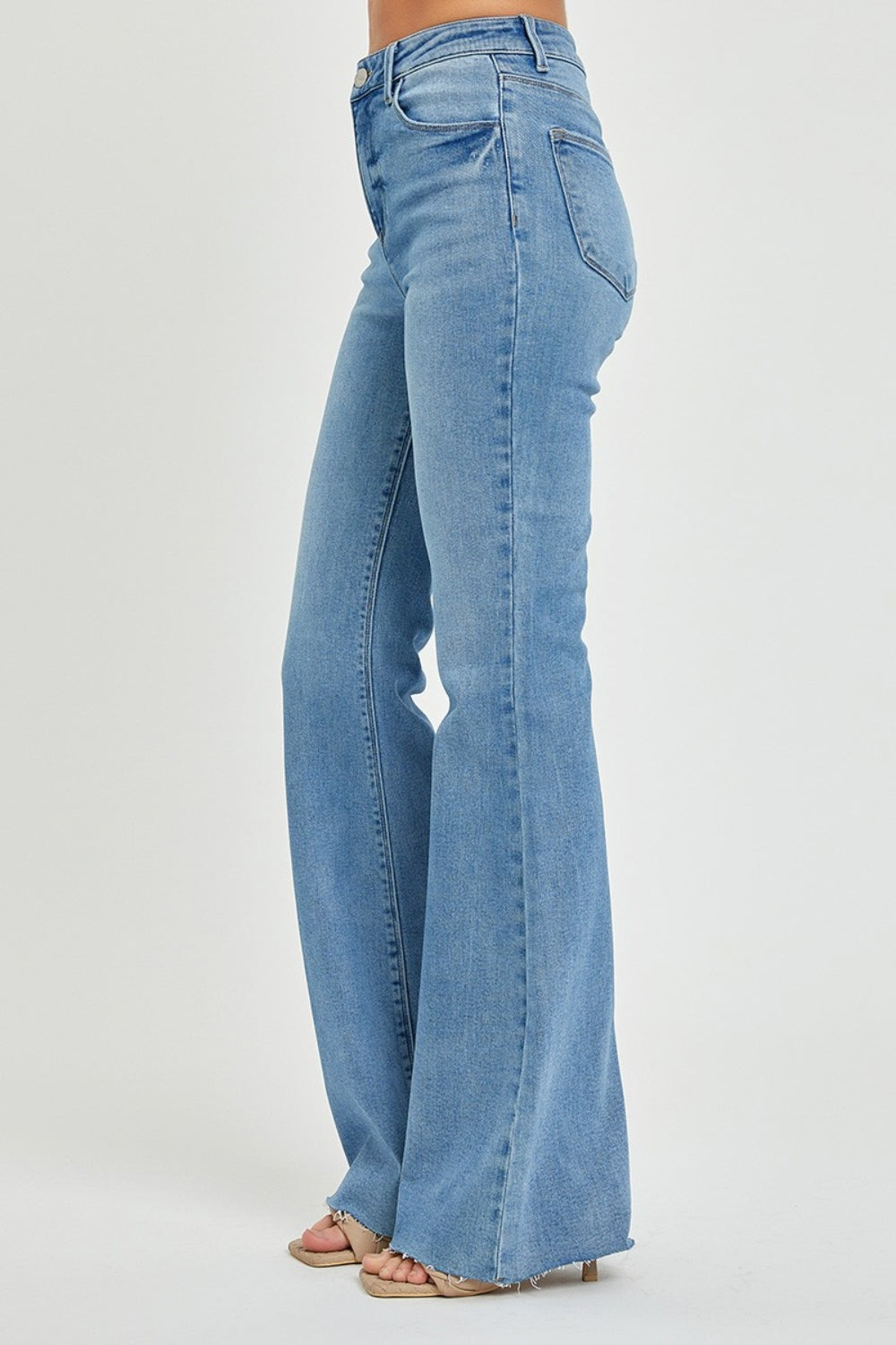 Risen High Rise Raw Hem Bootcut Jeans