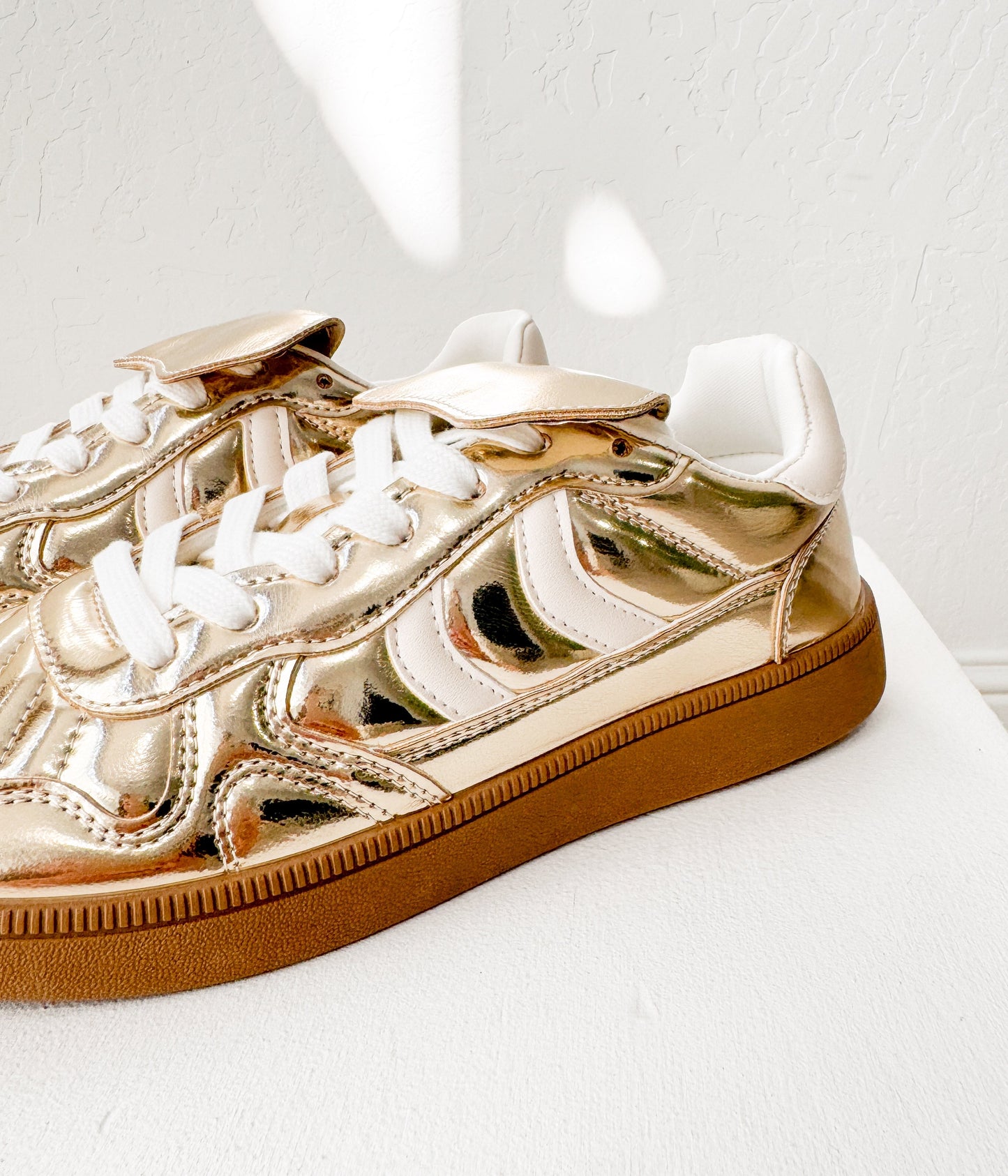 Milan Not Rated Metallic Sneaker in Gold