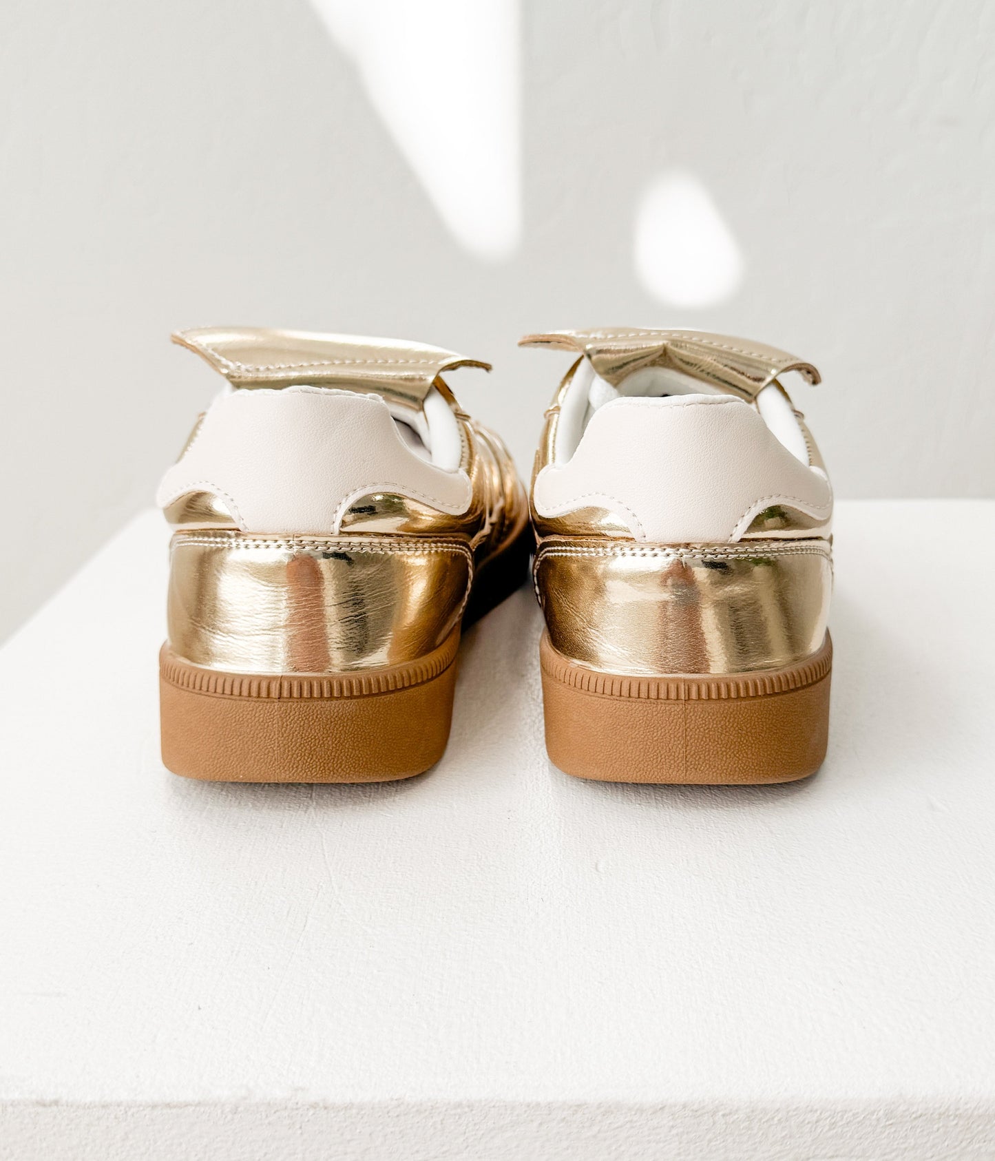 Milan Not Rated Metallic Sneaker in Gold